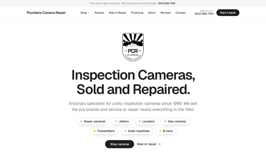 Camera sales and repair shop site on a desktop monitor